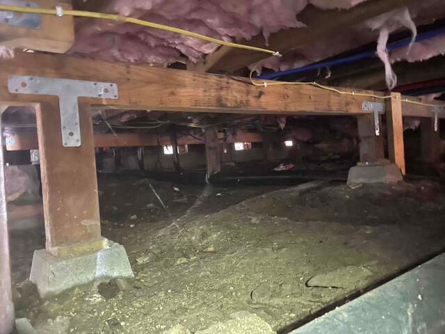 Additional before image of crawl space.