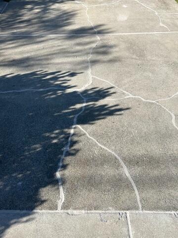 After image showing the sealed and stabilized driveway.