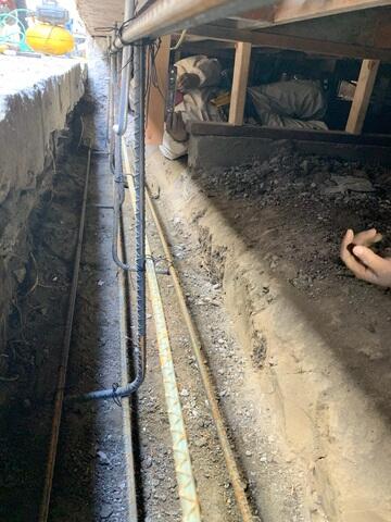 Additional progress image showing the installation of the new rebar for the new perimeter wall pour.