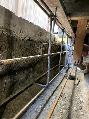 Progress image after sectional foundation removal and the adding of rebar for the new foundation pour.