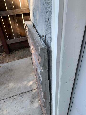 Another before image showing signs of stress on the exterior of the home.