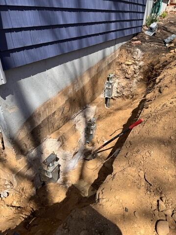 View of the Push Piers installed along the side of the home.