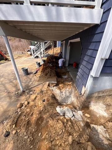 Beneath this deck, the crew had to dig most sections by hand due to the lack of access for the excavator. They dug down to gain access to the foundations footing.