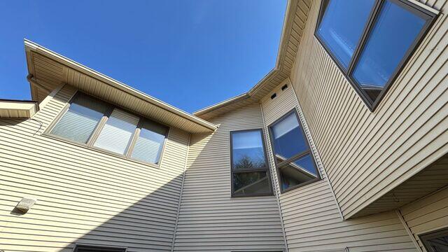 The exterior of the home showing where the bath fans were vented.