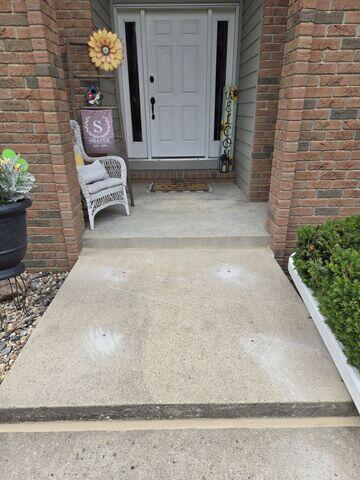 The step and walkway has been lifted with PolyLevel and the joints were sealed with NexusPro