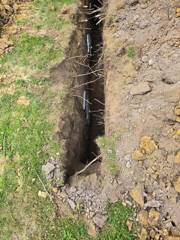 These robust earth anchors, installed in stable soil away from the foundation, are a key component of the GeoLock Wall Anchor System. They provide the necessary resistance to counteract external soil pressure, helping to stabilize and straighten bowing basement walls.