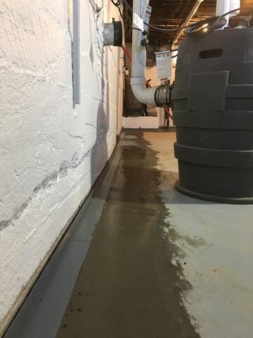 During: Our Foreman, Raul, and his crew installed WaterGuard around the basement perimeter.