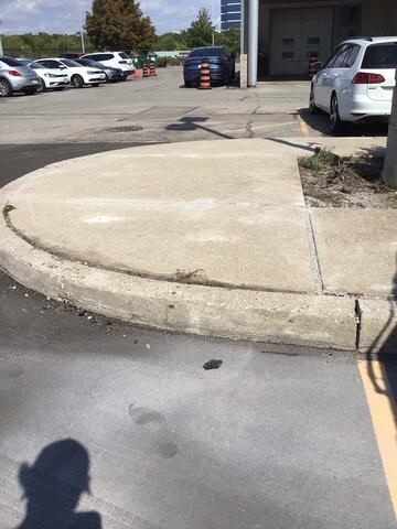 The sidewalk is now perfectly level and seamless, eliminating the safety hazard and restoring a professional, clean look to the property.