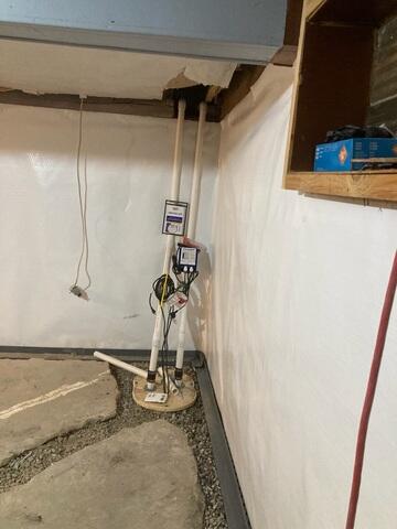 During: Our Foreman, Emmanuel, and his crew installed the waterproofing products throughout the basement.