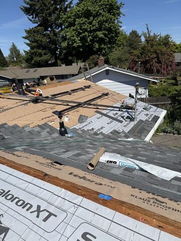 The Installation process of a Klaus Roof. The team used Dynasty IKO Asphalt shingles on this roof project.