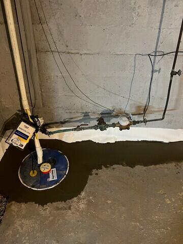 The SuperSump System has been installed as well as a layer of WaterGuard to assist any water intrusion to make it's way to the pump. This will ensure the basement will stay dry, especially during periods of heavy rainfall.