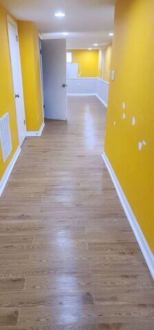 Finally, we had our crew install ThermalDry Elite Flooring to create a warm, waterproof, and stylish basement floor that resists moisture and enhances comfort year-round.