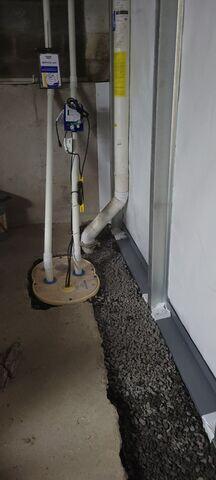 The PowerBrace System has been installed to secure the bowing wall, as well as the CleanSpace and Waterguard System to assist in guiding water into the TripleSafe Sump System to guide water away from the home.