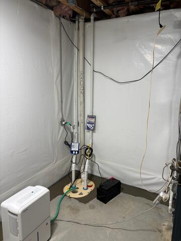 The crew installed our TripleSafe Sump Pump System to provide triple the protection against basement flooding, ensuring reliable performance even during heavy storms or power outages.