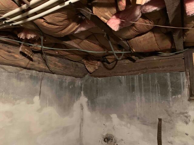Signs of water and moisture on foundation walls