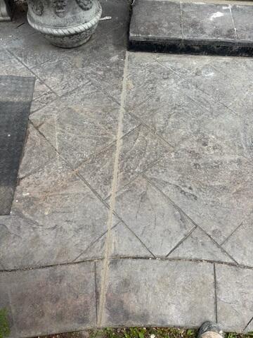 After: The patio's appearance is significantly improved with clean, uniformly sealed joints, indicating a complete and effective restoration.