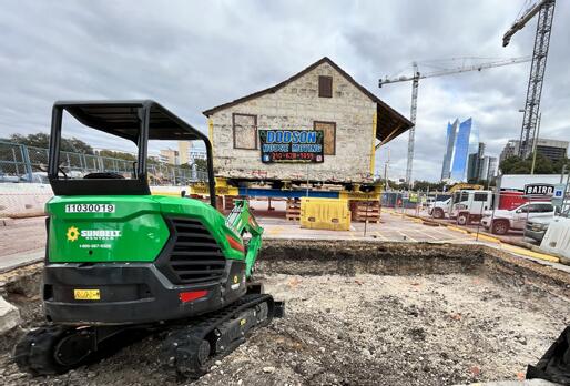Excavating relocation area for helical piers