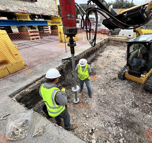 Installing helical piers