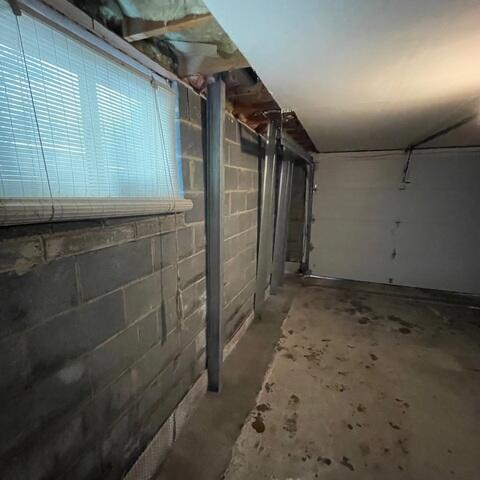 This photo shows the different variations in the level of the wall. The Powerbrace System will help to secure this wall from any further bowing.