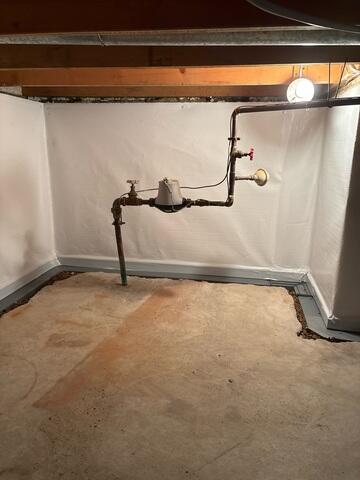 During: The crew attached CleanSpace on the walls and WaterGuard has been placed around the perimeter