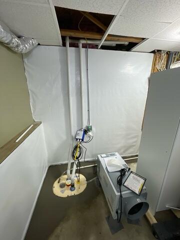 After: The flooring has been restored and the Aprilaire was installed