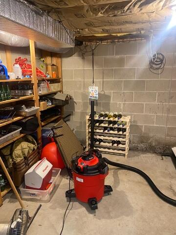 Before: Signs of water intrusion can be seen in the basement