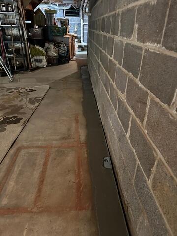 The crew added our WaterGuard System to capture water at the foundation level and direct it to the sump pump, keeping the basement dry while protecting the foundation from water damage.