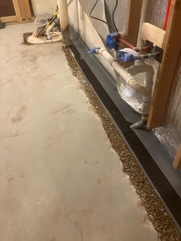 Our crew in the process of installing WaterGuard and SuperSump+
