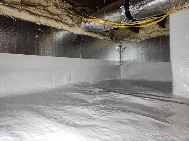 Our CleanSpace Vapor Barrier was used to seal the crawl space from ground moisture, preventing mold growth and creating a cleaner, healthier environment below the home.