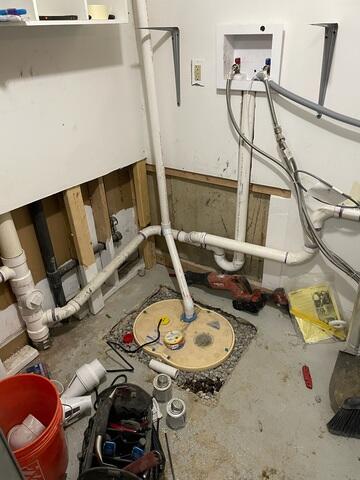 The crew in the process of installing SuperSump+