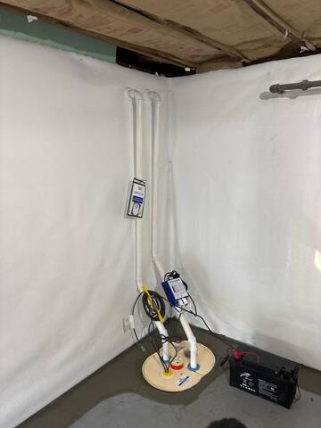 The TripleSafe Sump Pump now works as the heart of the basement's waterproofing system, protecting the home from flooding, even during power outages.