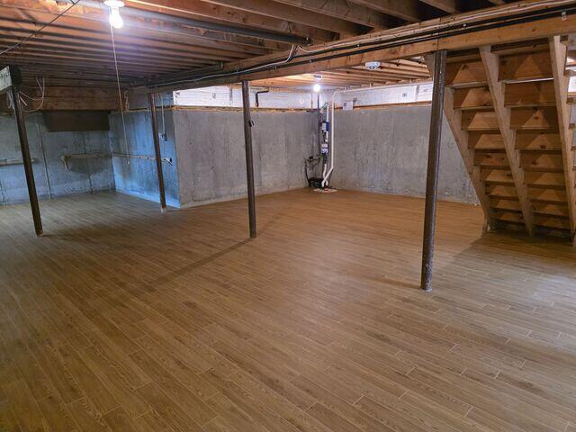 The Elite Plank Flooring in the color Pecan looks amazing in this basement. But it's not only beautiful, its waterproof too!