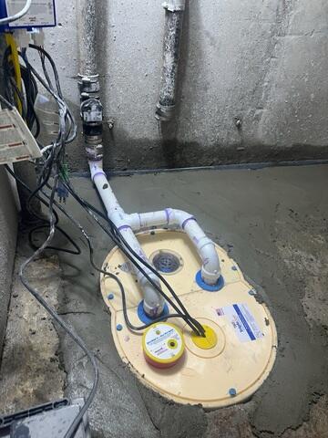 Our team installed a powerful TripleSafe sump system, offering triple-layer protection to keep this large underground space dry in all conditions.