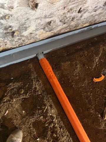 We installed our StarPipe and WaterGuard Drainage Systems to effectively manage groundwater and prevent moisture buildup. StarPipe directs water away from the foundation, while WaterGuard collects and channels it safely, protecting the home from potential water damage.