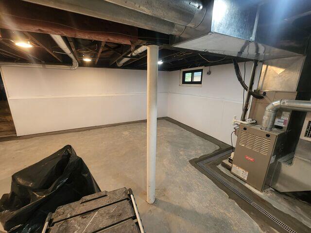WaterGuard is sealed beneath the new concrete layer, and CleanSpace protects the walls from moisture.