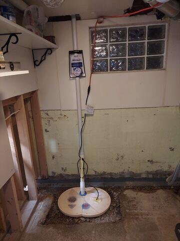 Our crew in the process of installing WaterGuard and SuperSump+