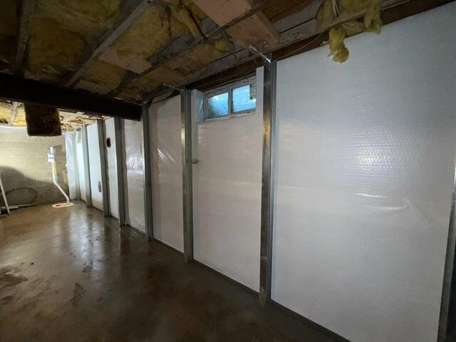 A combination of waterproofing and structural support gives this basement renewed function and peace of mind.