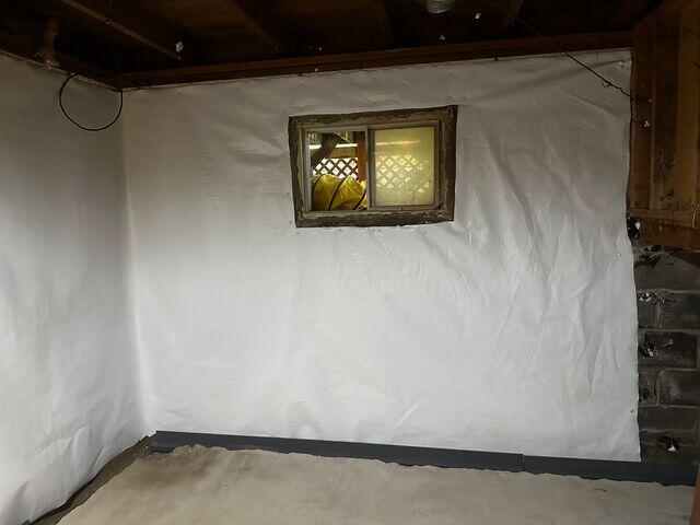 WaterGuard basement waterproofing system and CleanSpace wall membrane: a durable waterproofing solution.