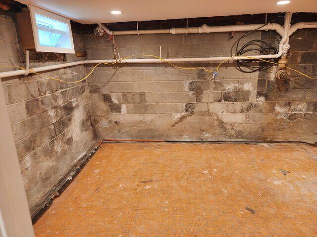 This Ringwood, NJ basement was once fully finished, but repeated flooding forced the homeowner to tear out drywall and flooring.