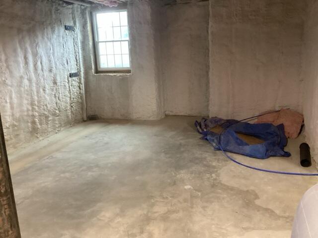 Damp basement walls and a musty smell were clear signs that water intrusion was becoming a problem for this Princeton home.