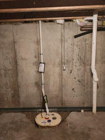 During: Arturo, one of our Foremen, and his crew replaced the sump pump and installed WaterGuard around the basement perimeter.
