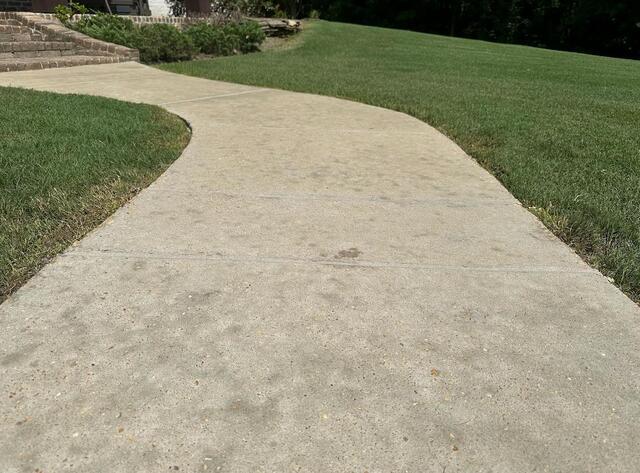 Here is the same spot once our work was done! Completely raised, smoothed out, and safe to move on.