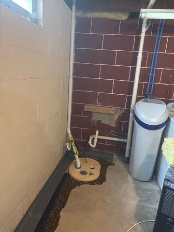 During: The crew installed SuperSump+ and WaterGuard