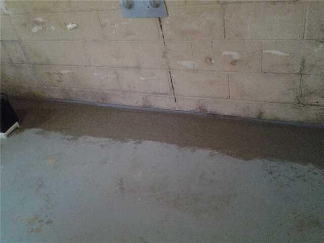 During: Our Design Specialist recommended installing WaterGuard around the basement perimeter.