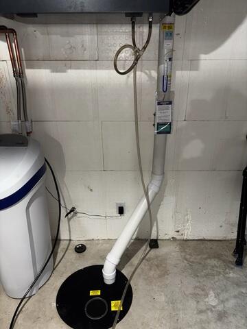 During: Our Foreman, Dakota, and his crew installed a part of the Radon Mitigation System on the interior.