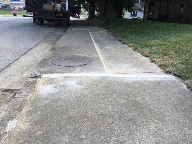 Spot 1 - After Photo: You can see we eliminated the tripping hazards by lifting and sealing the slabs back together.