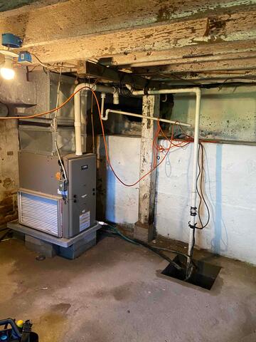 Before: The homeowner knew they needed to find a solution to their leaking basement.