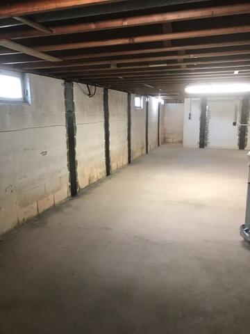 During: Our Design Specialist, Ryan, recommended installing several products throughout the basement.