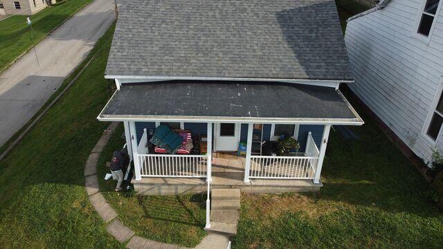 This is what the final product looked like. All new rubber roof, gutters, handrails, fascia, and trimming.