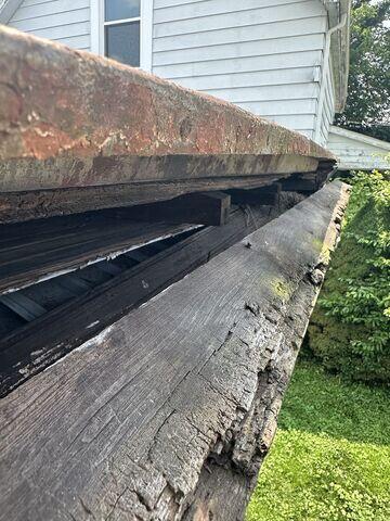 This close up of the rake board was very alarming before we replaced it.